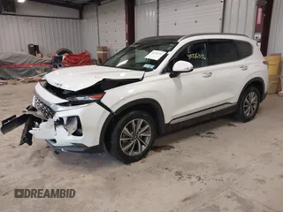 2019 Hyundai Santa Fe Limited with VIN 5NMS5CAD2KH021934, listed as a IAAI auction lot 40726332 with 52,994 mi miles. Bid and sale history available at carsss.com. Image 2.