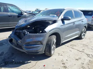 2018 Hyundai Tucson Sport with VIN KM8J33AL5JU770092, listed as a IAAI auction lot 41395349 with 101,395 mi miles. Bid and sale history available at carsss.com. Image 2.