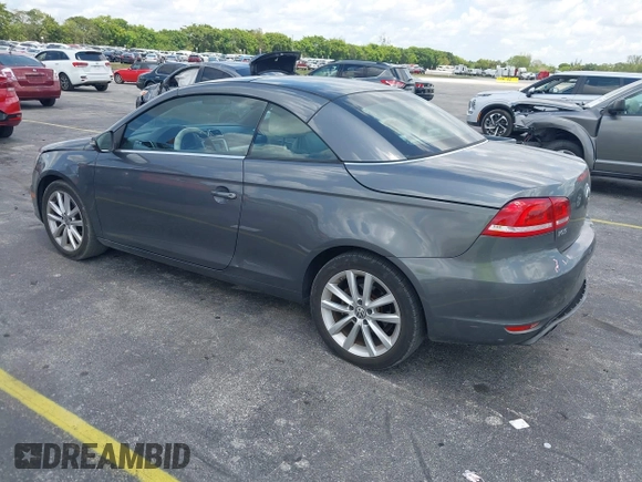 2014 Volkswagen Eos Sport with VIN WVWBW8AH2EV000313, listed as a IAAI auction lot 42333112 with 106,125 mi miles and . Bid and sale history available at DreamBid. Image 3.