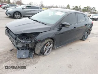 2017 Ford Focus SE with VIN 1FADP3FE4HL307110, listed as a IAAI auction lot 41992037 with 54,380 mi miles and . Bid and sale history available at DreamBid. Image 2.