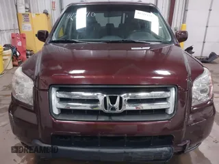 2007 Honda Pilot EX-L with VIN 5FNYF18537B017779, listed as a IAAI auction lot 41721110 with 98,724 mi miles. Bid and sale history available at carsss.com. Image 12.