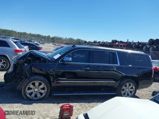 2016 GMC Yukon XL Denali with VIN 1GKS1HKJ5GR435925, listed as a IAAI auction lot 41727259 with 137,098 mi miles. Bid and sale history available at carsss.com. Image 14.