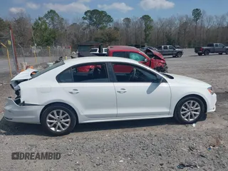2015 Volkswagen Jetta Sedan 1.8T SE with VIN 3VWD17AJXFM249990, listed as a IAAI auction lot 41810073 with 127,683 mi miles. Bid and sale history available at carsss.com. Image 13.