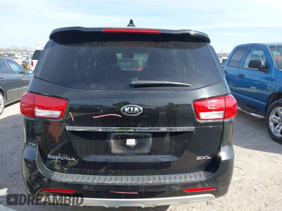 2015 Kia Sedona SX-L with VIN KNDME5C10F6033882, listed as a IAAI auction lot 41808805 with 81,936 mi miles and . Bid and sale history available at DreamBid. Image 17.
