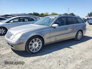 2005 Mercedes-Benz E 500 with VIN WDBUH83J35X168838, listed as a Copart auction lot 69885014 with 203,187 mi miles and Salvage Title. Bid and sale history available at carsss.com. Image 1.