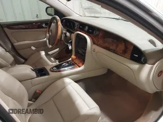 2004 Jaguar XJ with VIN SAJWA71C04SG33993, listed as a IAAI auction lot 41193040 with 79,944 mi miles. Bid and sale history available at carsss.com. Image 5.