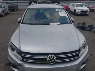 2012 Volkswagen Tiguan SE z VIN WVGAV7AX4CW520340, wystawiony jako IAAI lot #42294414 z przebiegiem 120 009 mil mil oraz . Historia ofert i sprzedaży dostępna na DreamBid. Obrazek 13.