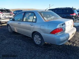 2003 Mitsubishi Lancer ES with VIN JA3AJ26E63U092730, listed as a IAAI auction lot 41506294 with 188,007 mi miles. Bid and sale history available at carsss.com. Image 3.