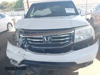2013 Honda Pilot EX-L with VIN 5FNYF4H75DB007169, listed as a IAAI auction lot 41923727 with 135,105 mi miles and . Bid and sale history available at DreamBid. Image 6.