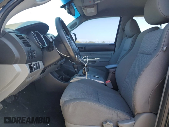 2013 Toyota Tacoma with VIN 3TMLU4EN9DM109458, listed as a Copart auction lot 47403635 with 131,766 mi miles and Salvage Title. Bid and sale history available at DreamBid. Image 7.