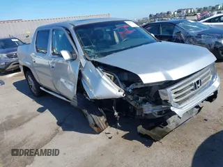 2012 Honda Ridgeline RTL with VIN 5FPYK1F56CB457687, listed as a IAAI auction lot 42582331 with 96,357 mi miles and . Bid and sale history available at DreamBid. Image 6.