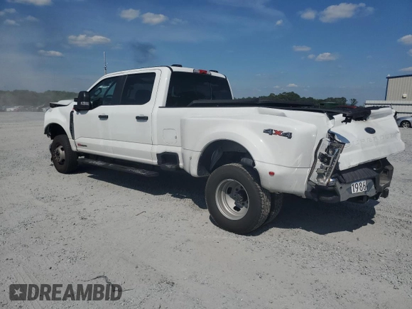 2023 Ford F-350 XL with VIN 1FT8W3DM3PEC71986, listed as a Copart auction lot 55861654 with 14,969 mi miles and Salvage Title. Bid and sale history available at DreamBid. Image 2.