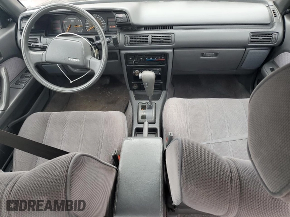 1991 Toyota Camry DLX z VIN 4T1SV21E0MU450578, wystawiony jako Copart lot #73990024 z przebiegiem 149 342 mil mil oraz Czysty tytuł • Clean title. Historia ofert i sprzedaży dostępna na DreamBid. Obrazek 8.