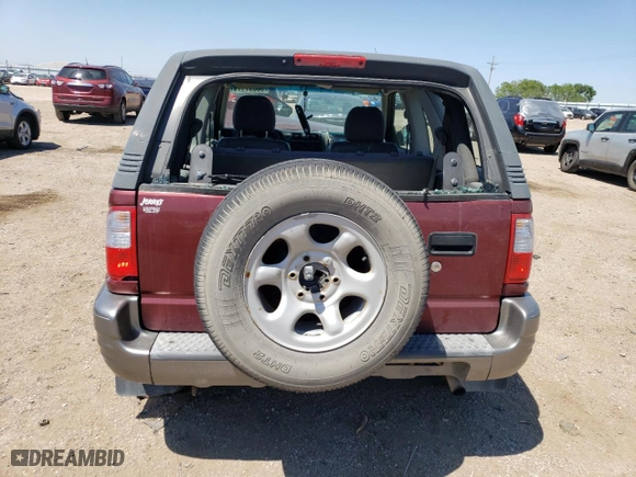 2002 Isuzu Rodeo Sport with VIN 4S2CK57W324328446, listed as a Copart auction lot 58097174 with 118,514 mi miles and Salvage Title. Bid and sale history available at carsss.com. Image 6.