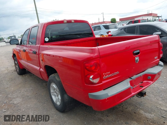 2007 Dodge Dakota SLT with VIN 1D7HE48K17S103188, listed as a IAAI auction lot 42187066 with 113,061 mi miles and . Bid and sale history available at carsss.com. Image 3.