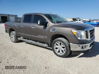 2017 Nissan Titan XD SV with VIN 1N6AA1F28HN551630, listed as a Copart auction lot 87104504 with 136,518 mi miles and Salvage Title. Bid and sale history available at carsss.com. Image 4.