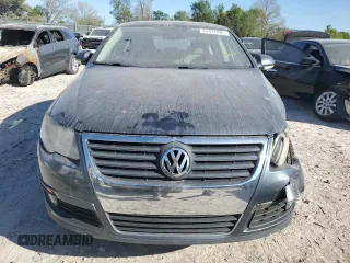 2009 Volkswagen Passat Komfort z VIN WVWJK73C49P049140, wystawiony jako Copart lot #53472005 z przebiegiem 193 458 mil mil oraz Szkoda całkowita • Salvage title. Historia ofert i sprzedaży dostępna na DreamBid. Obrazek 5.