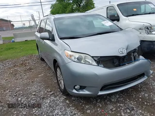 2016 Toyota Sienna XLE z VIN 5TDYK3DC6GS724009, wystawiony jako IAAI lot #42172295 z przebiegiem 149 341 mil mil oraz . Historia ofert i sprzedaży dostępna na DreamBid. Obrazek 1.