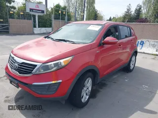 2013 Kia Sportage LX with VIN KNDPBCA26D7355889, listed as a IAAI auction lot 42054415 with 136,859 mi miles and . Bid and sale history available at carsss.com. Image 6.