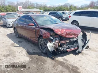 2015 Lincoln MKZ z VIN 3LN6L2JK1FR620860, wystawiony jako IAAI lot #42017527 z przebiegiem 185 892 mil mil oraz . Historia ofert i sprzedaży dostępna na DreamBid. Obrazek 1.