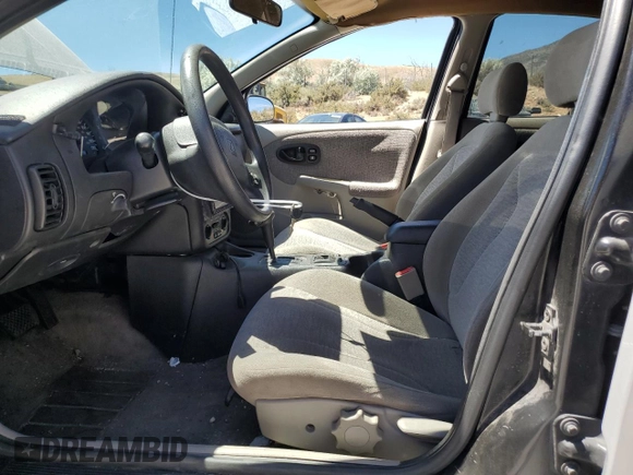 2001 Saturn SL with VIN 1G8ZK52731Z237050, listed as a Copart auction lot 60977394 with Not provided miles and Salvage title. Bid and sale history available at DreamBid. Image 7.