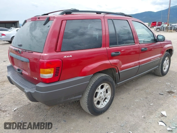 2001 Jeep Grand Cherokee Laredo with VIN 1J4GW48N51C732011, listed as a IAAI auction lot 42194017 with 195,716 mi miles and . Bid and sale history available at DreamBid. Image 4.