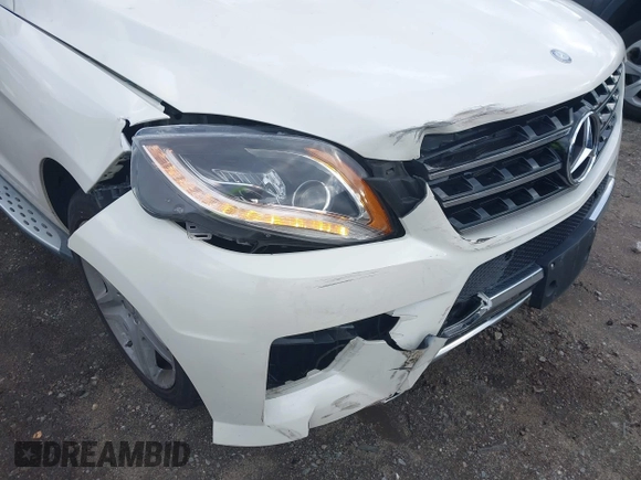 2015 Mercedes-Benz M 400 with VIN 4JGDA5GB3FA534787, listed as a IAAI auction lot 41084917 with 116,325 mi miles and . Bid and sale history available at DreamBid. Image 6.