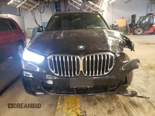 2019 BMW X5 xDrive50i with VIN 5UXJU2C55KLN67350, listed as a Copart auction lot 73114672 with 18,704 mi miles. Bid and sale history available at carsss.com. Image 5.