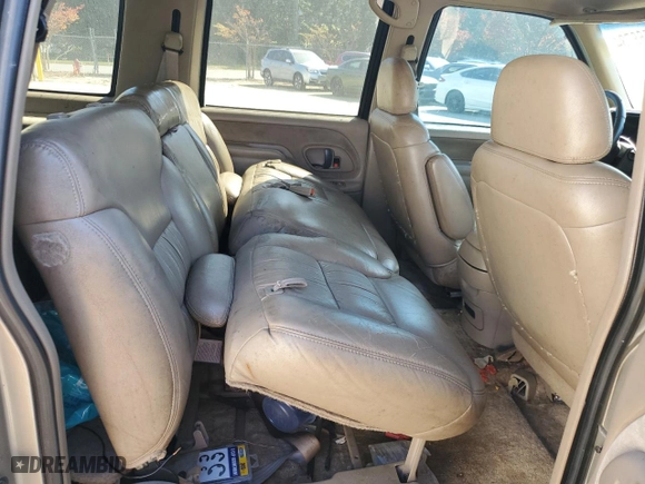 1999 GMC Suburban with VIN 3GKEC16R7XG542862, listed as a Copart auction lot 77568734 with 251,717 mi miles and Salvage Title. Bid and sale history available at carsss.com. Image 12.