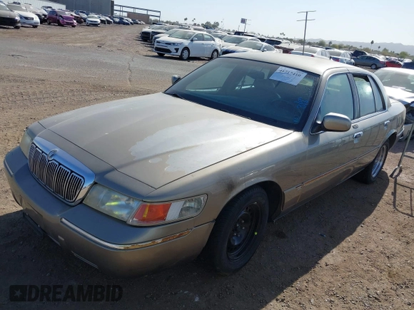 2002 Mercury Grand Marquis LS Premium z VIN 2MEFM75W32X636872, wystawiony jako IAAI lot #41717410 z przebiegiem 88 840 mil mil oraz . Historia ofert i sprzedaży dostępna na DreamBid. Obrazek 2.