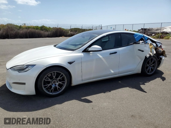 2021 Tesla Model S Plaid с VIN 5YJSA1E66MF453717, выставлен на аукционе Copart как лот 49330355 с пробегом 64 458 миль миль и Списание • Salvage title. История ставок и продаж доступна на DreamBid. Изображение 1.