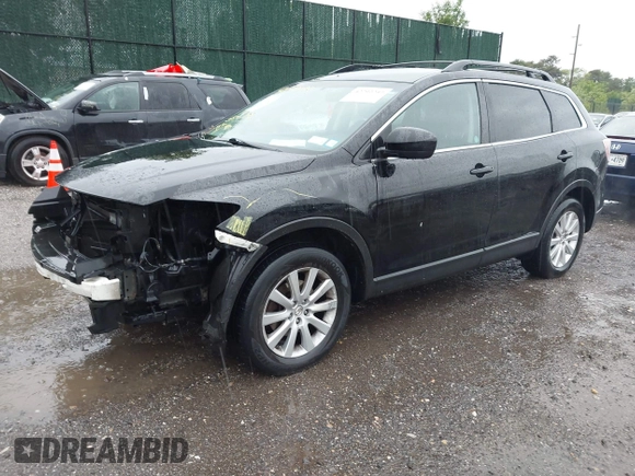 2010 Mazda CX-9 Grand Touring with VIN JM3TB2MV6A0218378, listed as a IAAI auction lot 42292237 with 114,657 mi miles and . Bid and sale history available at DreamBid. Image 2.