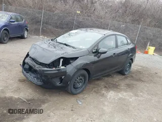 2012 Ford Fiesta S with VIN 3FADP4AJ8CM145208, listed as a IAAI auction lot 41784292 with 99,167 mi miles. Bid and sale history available at carsss.com. Image 2.