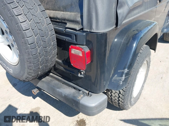 2005 Jeep Wrangler X with VIN 1J4FA39S35P372731, listed as a IAAI auction lot 41875121 with 146,034 mi miles and . Bid and sale history available at DreamBid. Image 6.