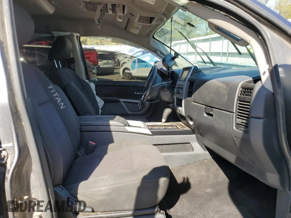 2015 Nissan Titan SL with VIN 1N6BA0EC5FN509230, listed as a Copart auction lot 73983574 with 144,288 mi miles and Salvage Title. Bid and sale history available at carsss.com. Image 7.
