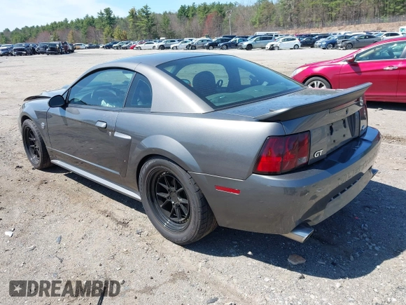 2004 Ford Mustang GT Deluxe with VIN 1FAFP42X44F142786, listed as a IAAI auction lot 42095619 with 100,020 mi miles and . Bid and sale history available at DreamBid. Image 3.