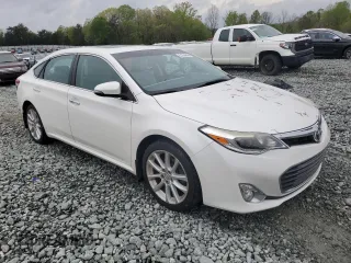 2014 Toyota Avalon Limited with VIN 4T1BK1EB1EU113048, listed as a Copart auction lot 51354945 with 106,474 mi miles and Salvage Title. Bid and sale history available at DreamBid. Image 4.