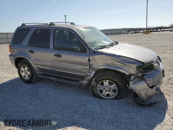2007 Ford Escape XLT с VIN 1FMYU93117KA75929, выставлен на аукционе Copart как лот 48467515 с пробегом 156 386 миль миль и Списание • Salvage title. История ставок и продаж доступна на DreamBid. Изображение 4.