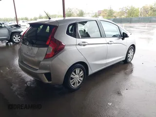 2016 Honda Fit LX with VIN JHMGK5H59GX017076, listed as a IAAI auction lot 41788349 with 83,295 mi miles. Bid and sale history available at carsss.com. Image 4.