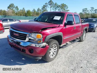 2006 GMC Sierra 1500 SLT with VIN 2GTEK13T761129104, listed as a IAAI auction lot 41811270 with 128,508 mi miles. Bid and sale history available at carsss.com. Image 2.