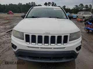 2016 Jeep Compass Sport z VIN 1C4NJCBA9GD600433, wystawiony jako Copart lot #61087545 z przebiegiem 132 956 mil mil oraz Szkoda całkowita • Salvage title. Historia ofert i sprzedaży dostępna na DreamBid. Obrazek 5.