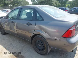 2005 Ford Focus S с VIN 1FAFP34N35W180596, выставлен на аукционе IAAI как лот 42569508 с пробегом 176 810 миль миль и . История ставок и продаж доступна на DreamBid. Изображение 14.