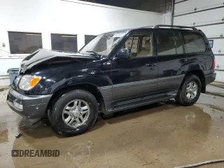 2002 Lexus LX 470 with VIN JTJHT00W023515545, listed as a Copart auction lot 79218054 with 310,334 mi miles and Salvage Title. Bid and sale history available at carsss.com. Image 1.