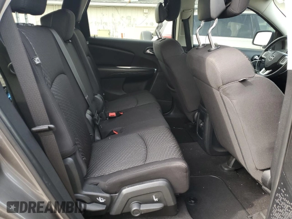2013 Dodge Journey SXT with VIN 3C4PDCBG5DT695888, listed as a Copart auction lot 50302485 with 126,720 mi miles and Salvage Title. Bid and sale history available at DreamBid. Image 11.