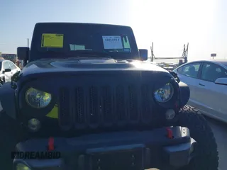 2015 Jeep Wrangler Unlimited Rubicon Hard Rock with VIN 1C4HJWFG7FL602344, listed as a IAAI auction lot 42011914 with 109,238 mi miles and . Bid and sale history available at DreamBid. Image 6.