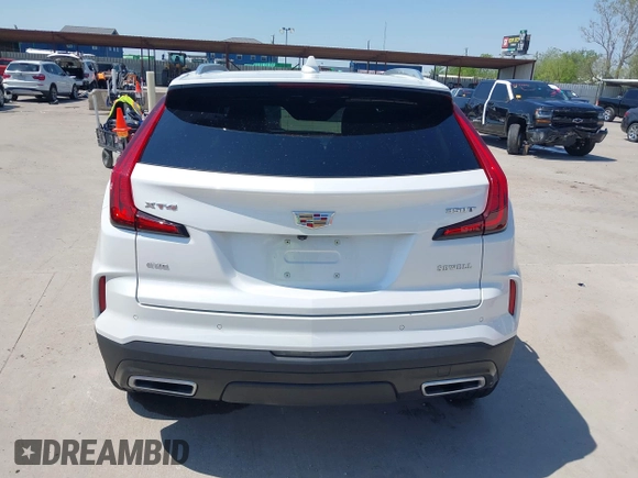 2024 Cadillac XT4 AWD Premium Luxury with VIN 1GYFZDR40RF100102, listed as a IAAI auction lot 41987175 with 4,935 mi miles and . Bid and sale history available at DreamBid. Image 16.
