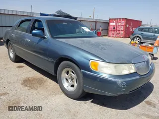 2002 Lincoln Town Car Executive with VIN 1LNHM81W62Y628895, listed as a IAAI auction lot 42479511 with 249,387 mi miles and . Bid and sale history available at DreamBid. Image 1.