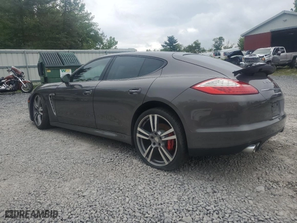 2013 Porsche Panamera Turbo with VIN WP0AC2A78DL090280, listed as a Copart auction lot 64410544 with 77,266 mi miles and Salvage Title. Bid and sale history available at carsss.com. Image 2.