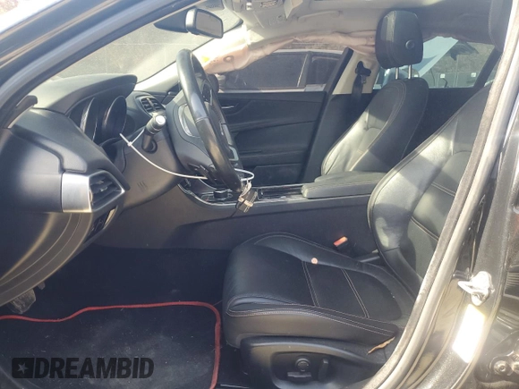 2018 Jaguar XE with VIN SAJAE4EV0JCP25584, listed as a Copart auction lot 77997954 with 31,996 mi miles and Salvage Title. Bid and sale history available at DreamBid. Image 7.