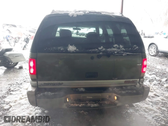 2001 GMC Jimmy SLE with VIN 1GKDT13W212171101, listed as a IAAI auction lot 41546523 with 229,471 mi miles. Bid and sale history available at carsss.com. Image 16.